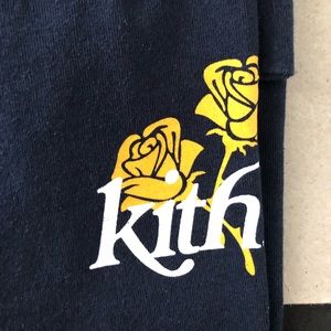 Kith Many worlds tee navy blue w/ yellow rose